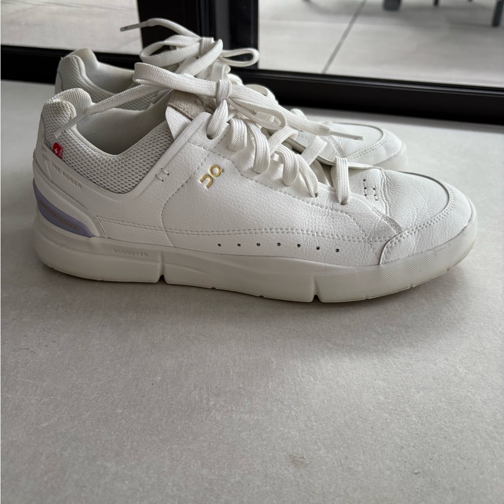 ON White Sneakers with Gold Details. “The Roger” tennis sneaker.